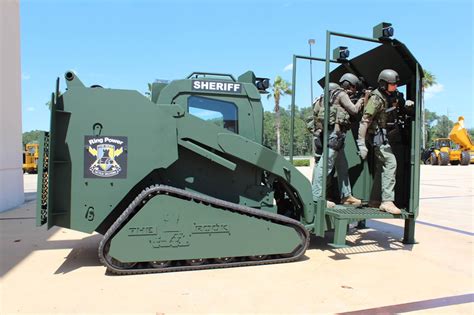 armoured skid steer|the rook armored vehicle.